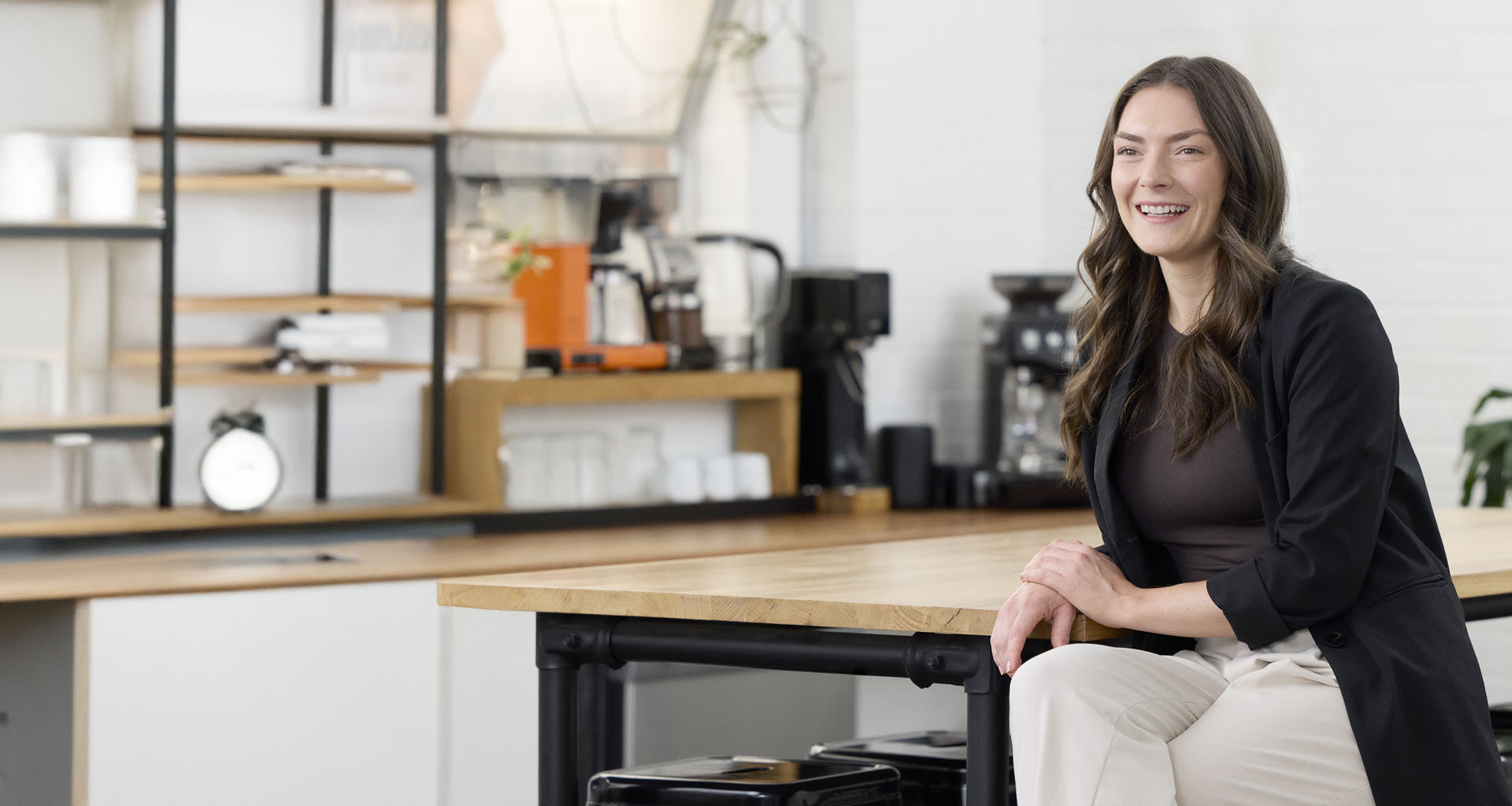 Stacey Day sitting at a table