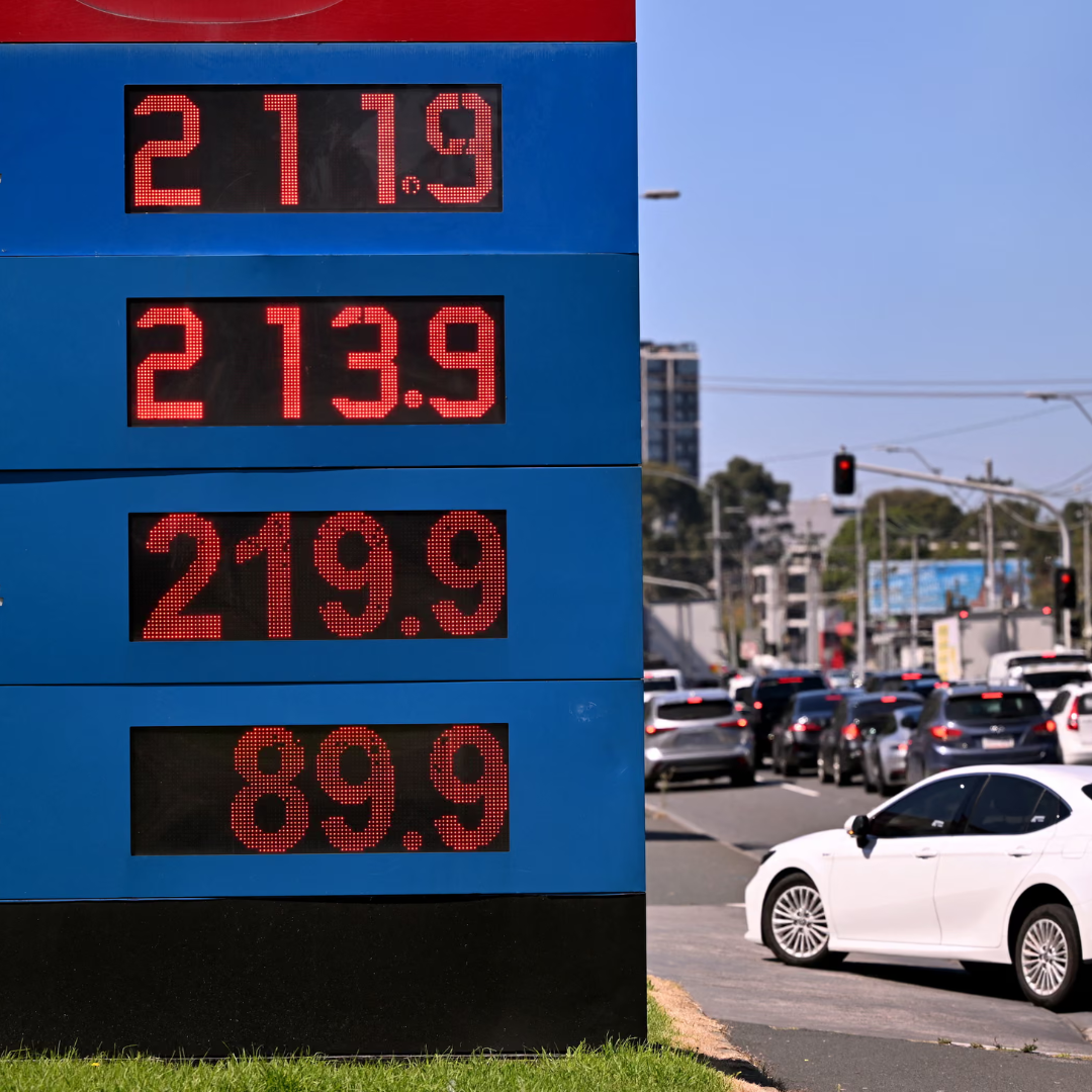 Petrol price board at an Australian fuel station showing rising fuel costs linked to inflation.