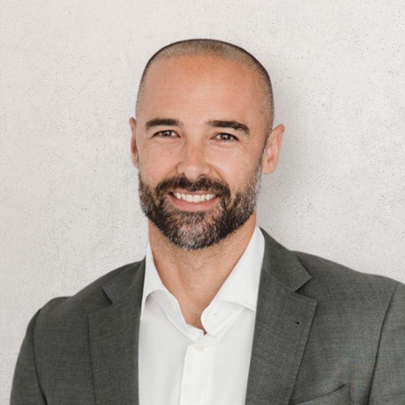 Professional headshot of UFinancial Director Nathan Romeo