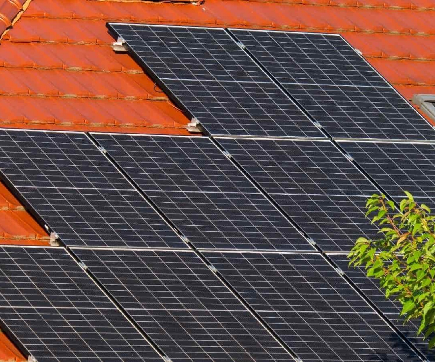 Orange-tiled roof with solar panels
