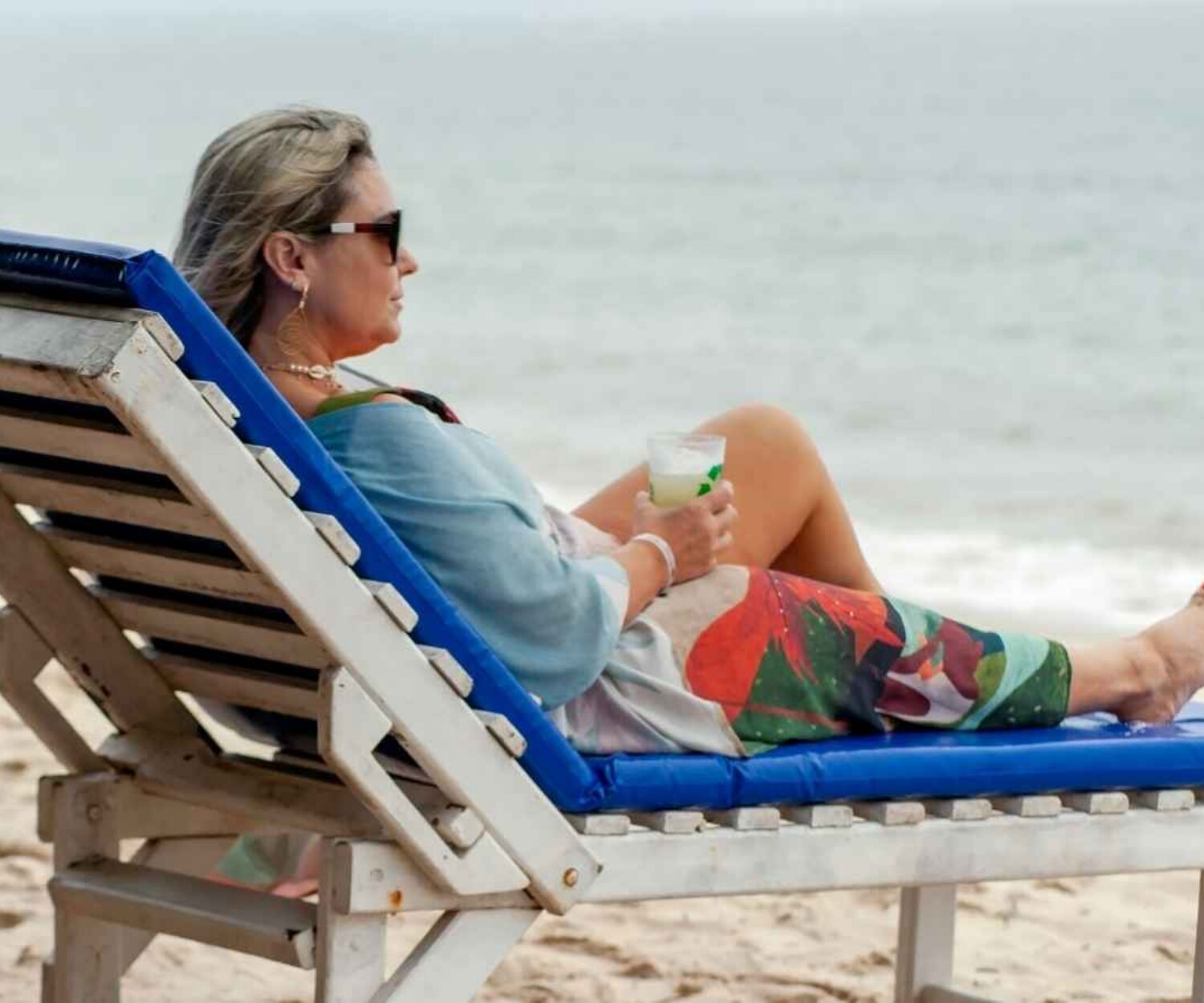 Woman relaxing on beach chair after divorce