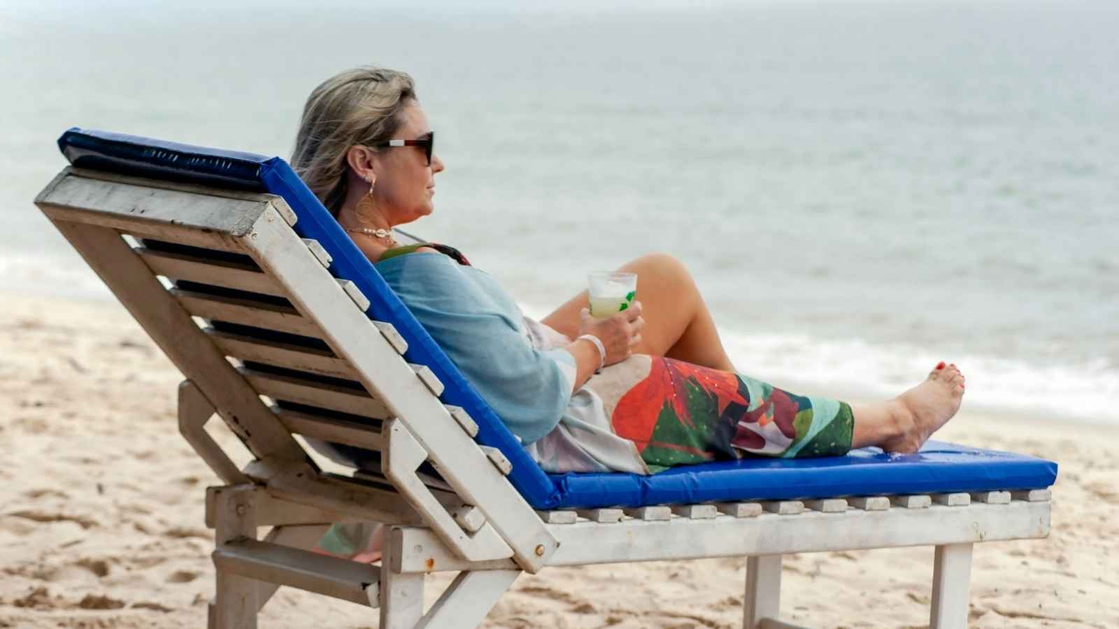 Woman relaxing on beach chair after divorce