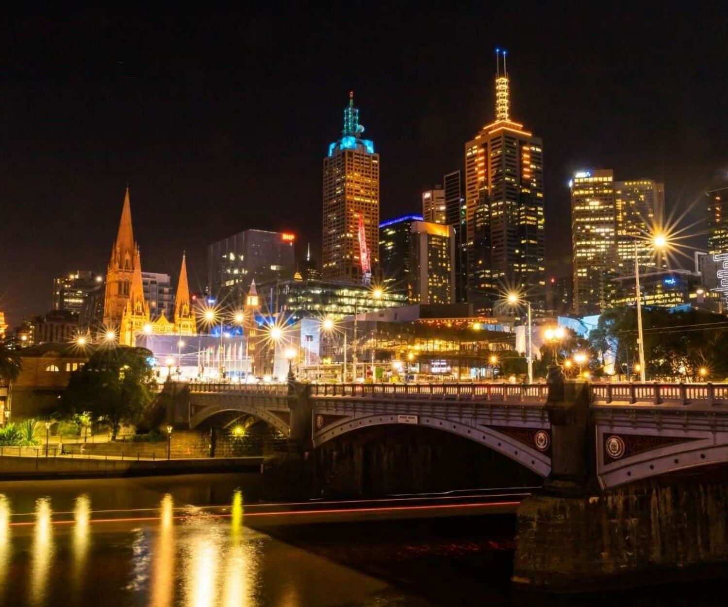 Melbourne city skyline lit up at night